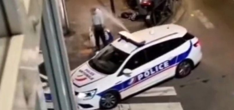 PARIS POLICEMEN FACE SUSPENSION FOR TEAR-GASSING HOMELESS MAN