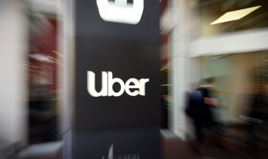 Uber reports loss, but beats income expectations