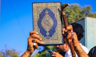 Swedish police try to silence man protesting Quran desecration