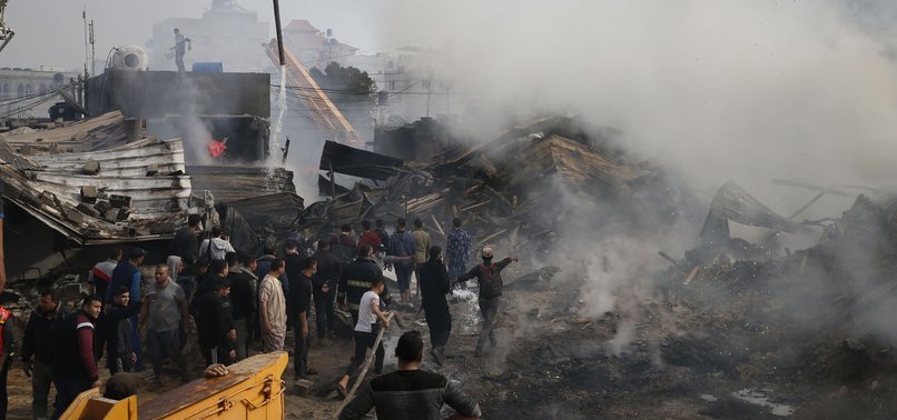AT LEAST 9 PALESTINIANS KILLED IN GAZA MARKET FIRE