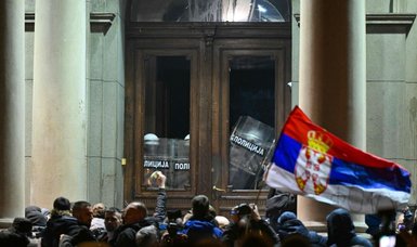 Clashes at latest protests against local election results in Belgrade