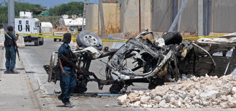 CAR BOMBS KILL AT LEAST 10, LEVEL HOUSES IN CENTRAL SOMALIA