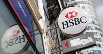 HSBC announces job cuts and radical overhaul as profits slide