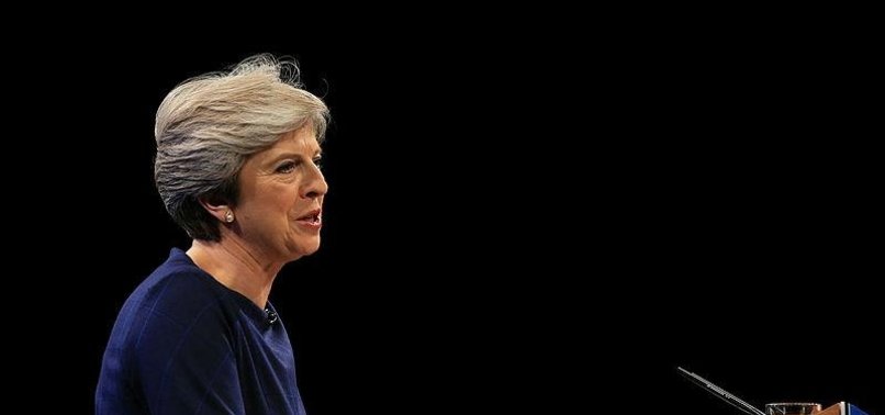 BRITISH PM MAY SAYS SHE WILL PROVIDE CALM LEADERSHIP