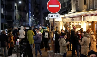 France imposes earlier curfew to curb infections