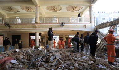 Death toll from Pakistan's mosque bombing rises to 100