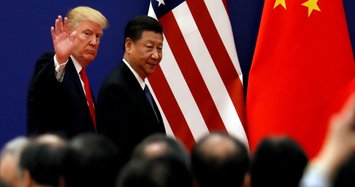 Trump warns China against dragging its feet in trade talks