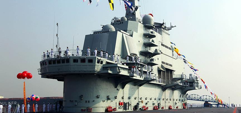 JAPAN ‘CAREFULLY’ MONITORING CHINESE AIRCRAFT CARRIER