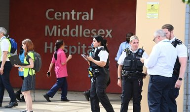Two people stabbed at London hospital - police