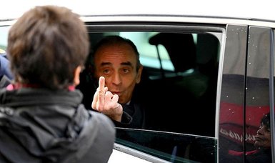 Giving finger, French presidential hopeful Zemmour sees campaign slump