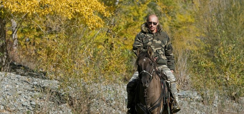 PUTIN TELLS HOW HE FELL OFF HORSE