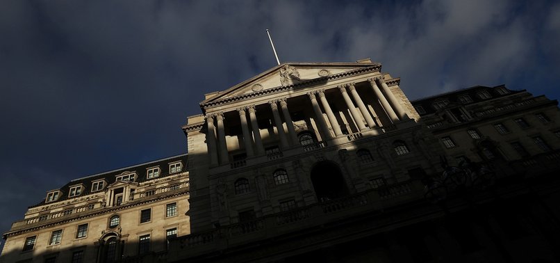 BANK OF ENGLAND HOLDS RATES, CUTS GROWTH FORECASTS AS BREXIT LOOMS