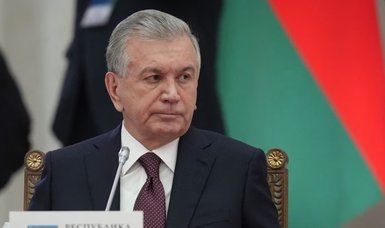 Uzbek leader calls early election after referendum