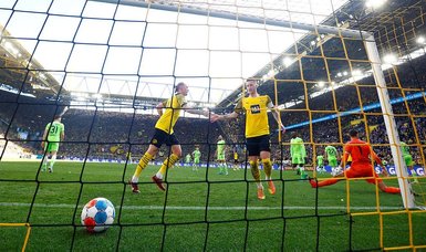 Dortmund hit Wolfsburg for six and close gap on Bayern