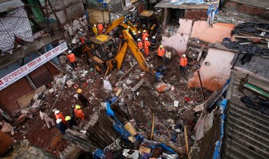 3-story building collapses in India in heavy rain, kills 11