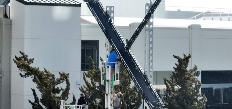 MUSK REMOVES GIANT, FLASHING X SIGN AFTER FURORE
