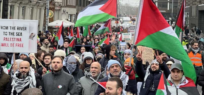 PRO-PALESTINE PROTESTERS POUR INTO AMSTERDAM STREETS TO CONDEMN ISRAELI MASSACRES IN GAZA STRIP