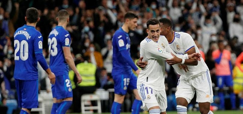 REAL MADRID STROLL PAST GETAFE TO CLOSE ON TITLE