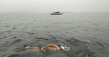 Turkish man becomes first Muslim to swim across the North Channel