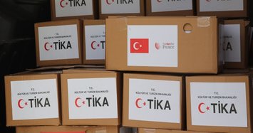 Turkey's state-run aid agency TIKA distributes food packages in Gambia’s rural areas