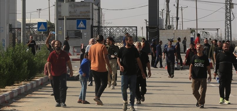 THOUSANDS OF PALESTINIAN WORKERS DEPORTED FROM ISRAEL RETURN TO GAZA