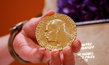 Nobel sold for Ukrainian kids shatters record at $103.5M