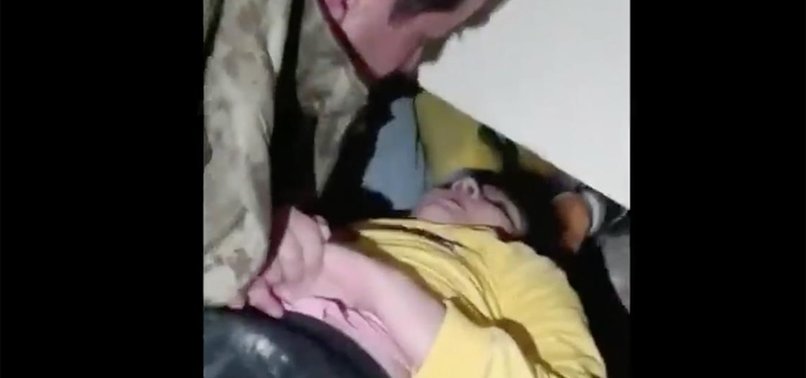 TURKISH SOLDIERS PULL LITTLE GIRL ALIVE FROM RUBBLE AFTER EARTHQUAKE