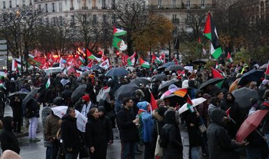 Parisian protesters stage anti-war demonstration by lying down to symbolize Gazan civilians killed by Israel
