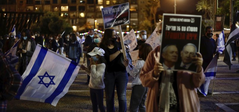 THOUSANDS PROTEST ISRAEL COALITION DEAL ON EVE OF COURT DATE