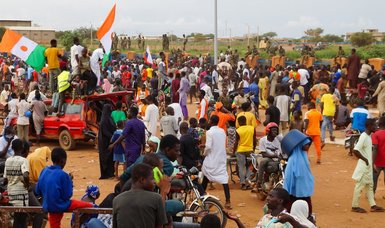 Thousands protest in support of coup leader near French military base in Niger
