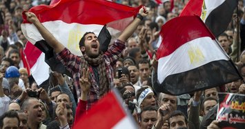 Egyptians pour into streets after Friday prayers to demand departure of al-Sisi