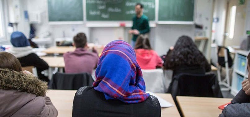 LOCAL COURT IN BELGIUM RULES AGAINST HEADSCARF BAN AT SCHOOLS