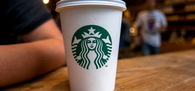 STARBUCKS REPORTS RECORD REVENUE AS STORE COUNT, PRICES RISE