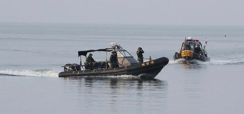 South Korea says slain man tried to defect to North Korea