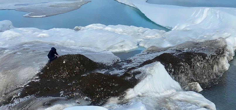 WORLDS MOST NORTHERLY ISLAND REVEALED TO BE GRAVEL-COVERED ICEBERG