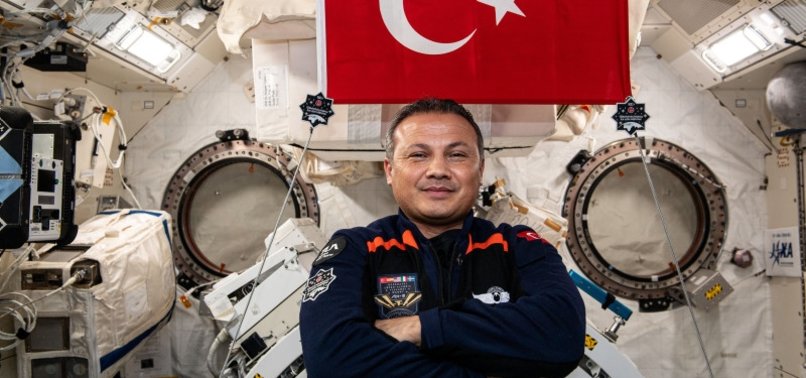 1ST TURKISH ASTRONAUT CONDUCTS MESSAGE EXPERIMENT IN SPACE