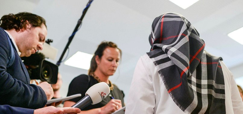 FEMALE TEACHER IN BERLIN BARRED FROM WEARING HEADSCARF AT WORK