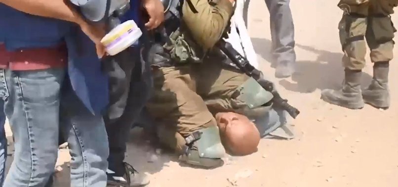 VIDEO SHOWS ISRAELI SOLDIER KNEELING ON ELDERLY PALESTINIAN PROTESTERS NECK