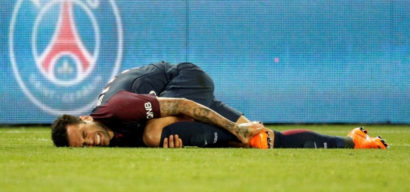 BRAZIL DEFENDER DANI ALVES RULED OUT OF WORLD CUP AFTER KNEE INJURY