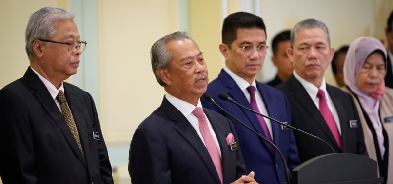 MALAYSIAN PREMIER FACING CALLS TO QUIT OVER ROYAL REBUFF