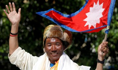 Sherpa guide breaks own record scaling Everest for 26th time
