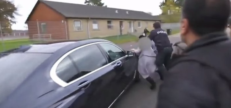 DENMARK IMMIGRATION MINISTERS CAR HITS A REFUGEE WOMAN WHILE LEAVING DEPORTATION CENTER