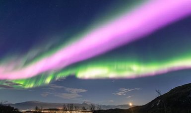 Rare pink auroras after solar storm causes hole in magnetosphere