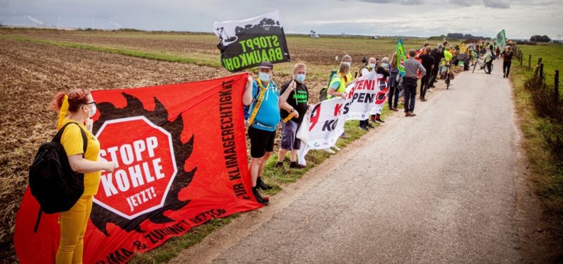 THOUSANDS OF ACTIVISTS RALLY TO CALL FOR A QUICK HALT TO COAL MINING IN WESTERN GERMANY