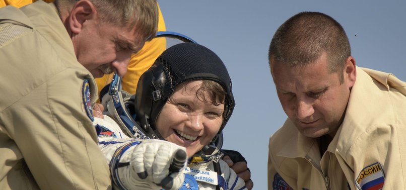 CANADIAN, RUSSIAN, AMERICAN BACK ON EARTH AFTER 204 DAYS IN SPACE