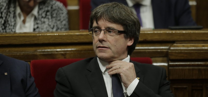 CATALAN LEADER SAYS SUSPENDING FULL INDEPENDENCE BID FOR DIALOGUE WITH SPAIN
