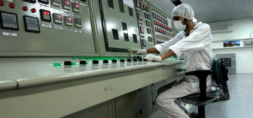 AHEAD OF IAEA VISIT, IRAN SAYS IT HAS DOUBLED URANIUM ENRICHMENT CAPACITY
