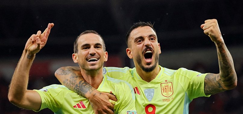 RUIZ DOUBLE HELPS 10-MAN SPAIN THUMP SWITZERLAND 4-1