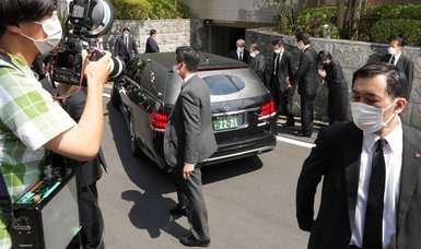 Japan mourns as body of assassinated ex-PM Abe arrives in Tokyo