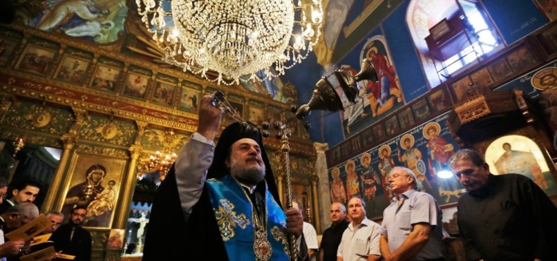 CATHOLIC CHRISTIANS IN GAZA PRAY FOR PEACE DURING CHRISTMAS LITURGY